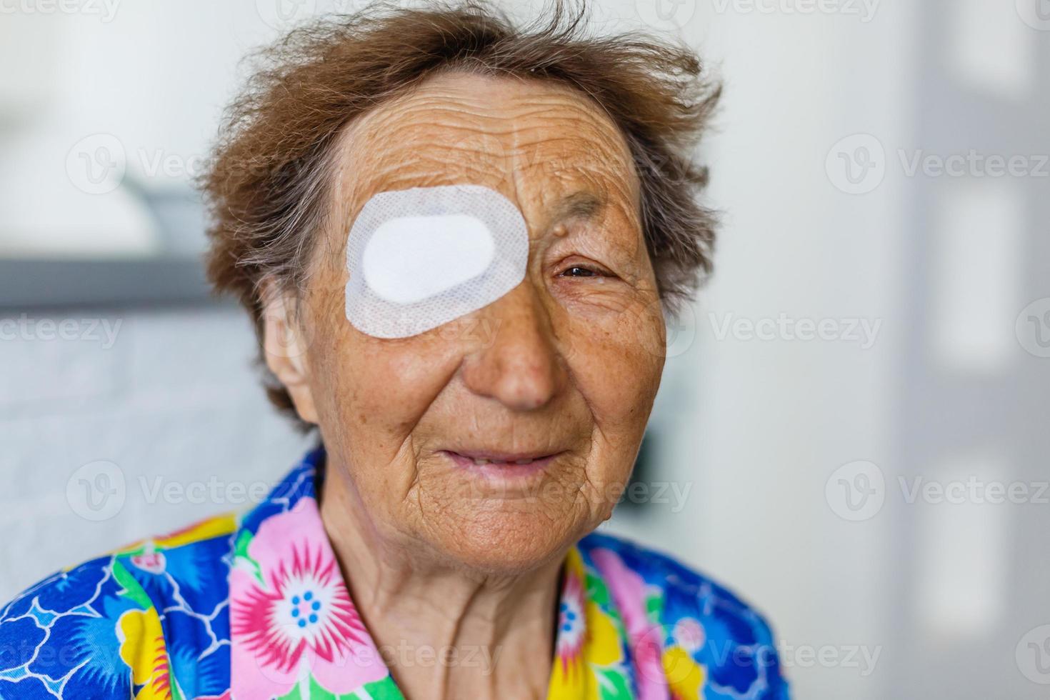 elderly woman with one eye surgery photo