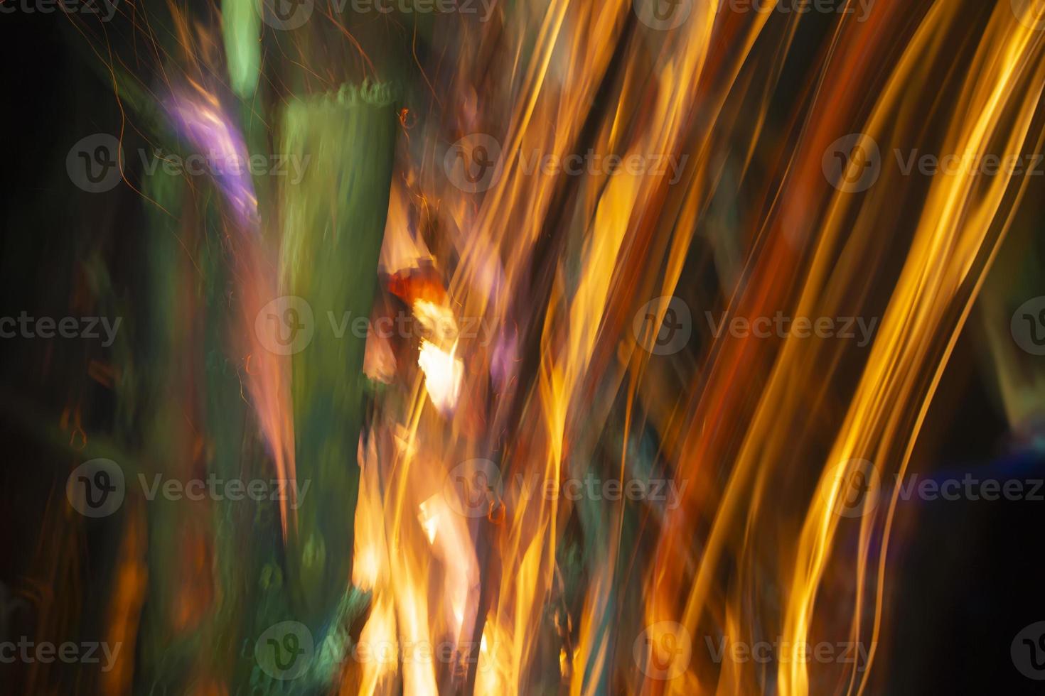 Abstract background of blurred stripes from salute and fireworks. Light multicolored effects. photo