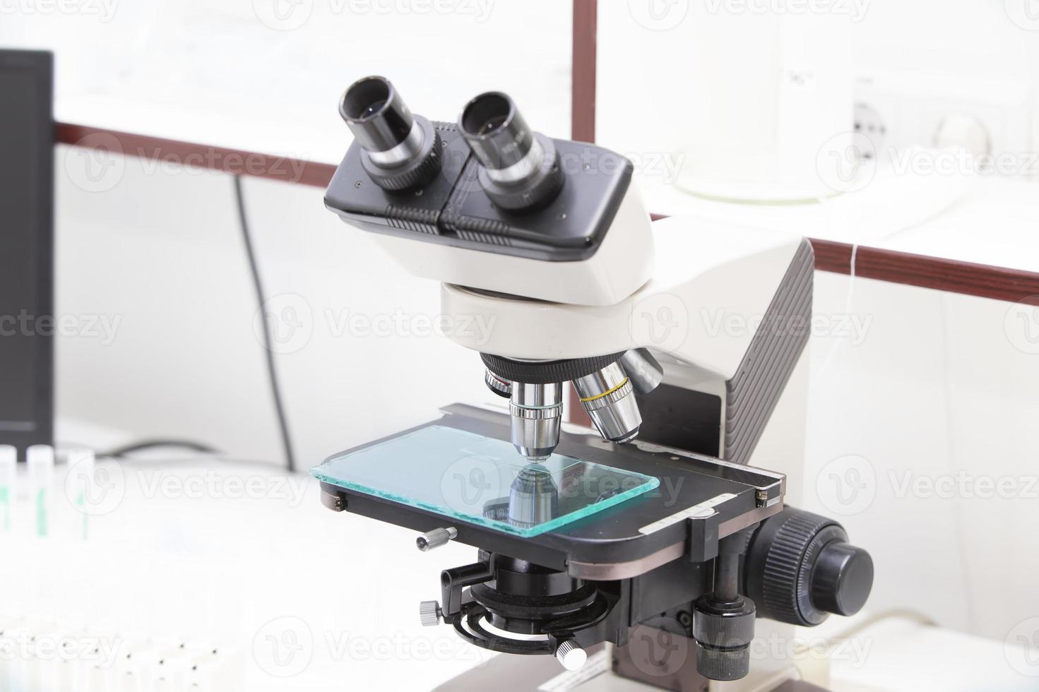 Medical microscope for the study of biological material. photo