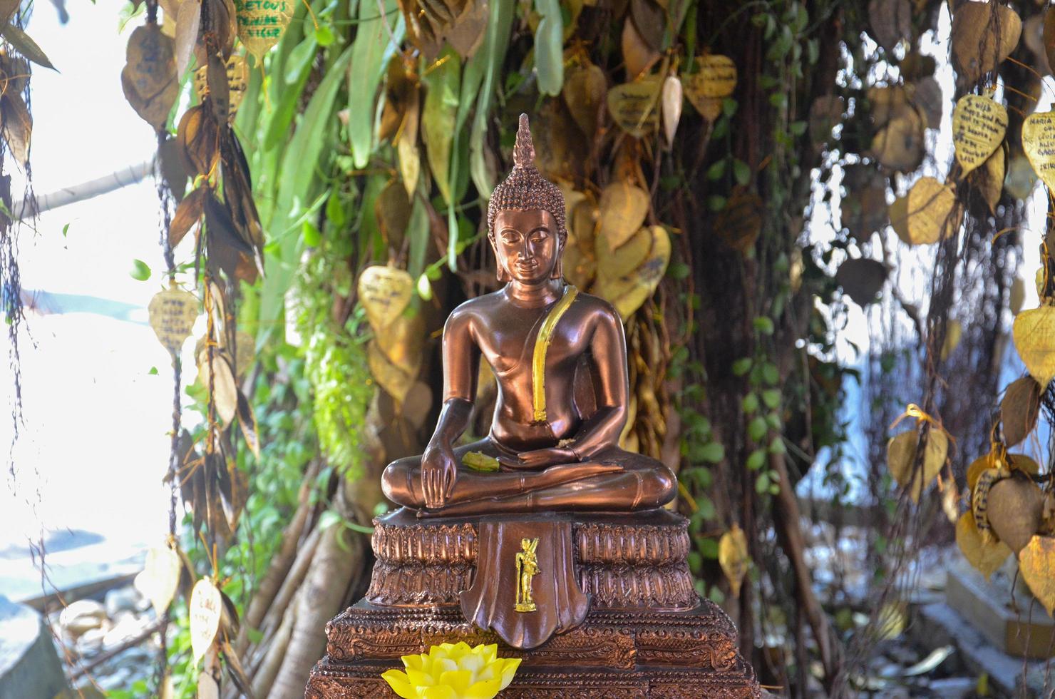 Small Buddha statues at The golden mount temple, Thailand's major tourist attraction, are popular with foreign tourists. photo