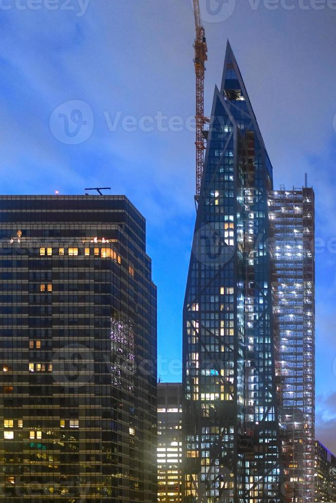 Construction along Billionaire's Alley in New York City in the evening. photo