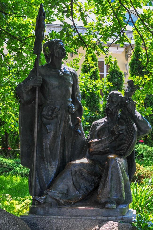 Monument to the Cossack with Bandura musical instrument in Kiev, Ukraine, 2021 photo