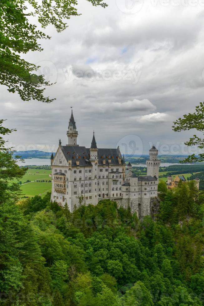 World-famous Neuschwanstein Castle, the nineteenth-century Romanesque Revival palace built for King Ludwig II on a rugged cliff near Fussen, southwest Bavaria, Germany photo