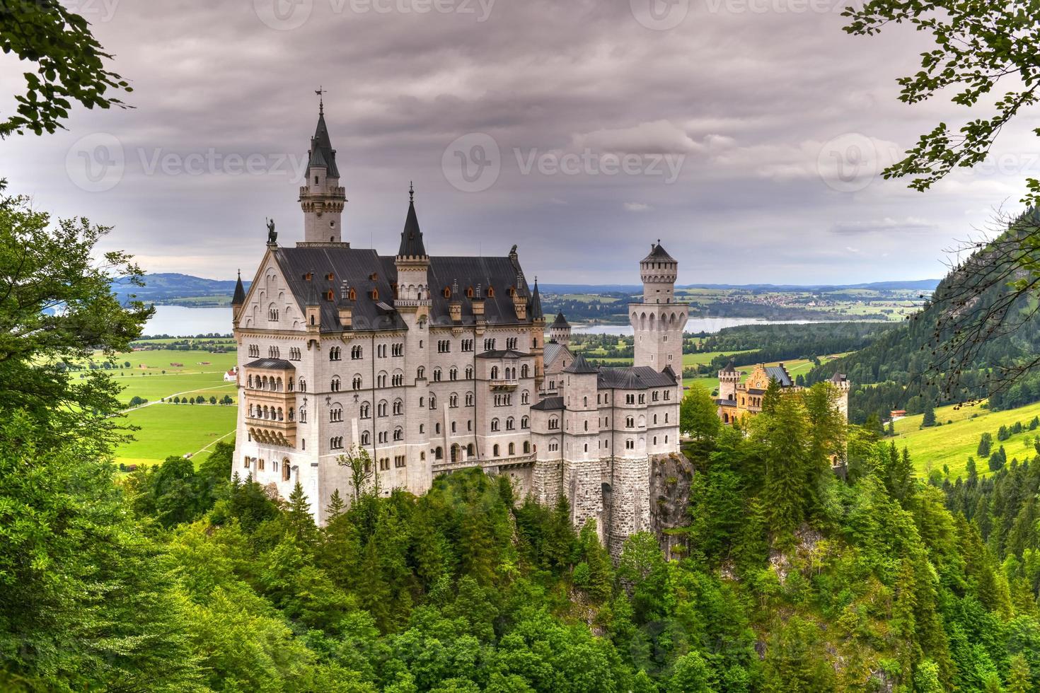 World-famous Neuschwanstein Castle, the nineteenth-century Romanesque Revival palace built for King Ludwig II on a rugged cliff near Fussen, southwest Bavaria, Germany photo