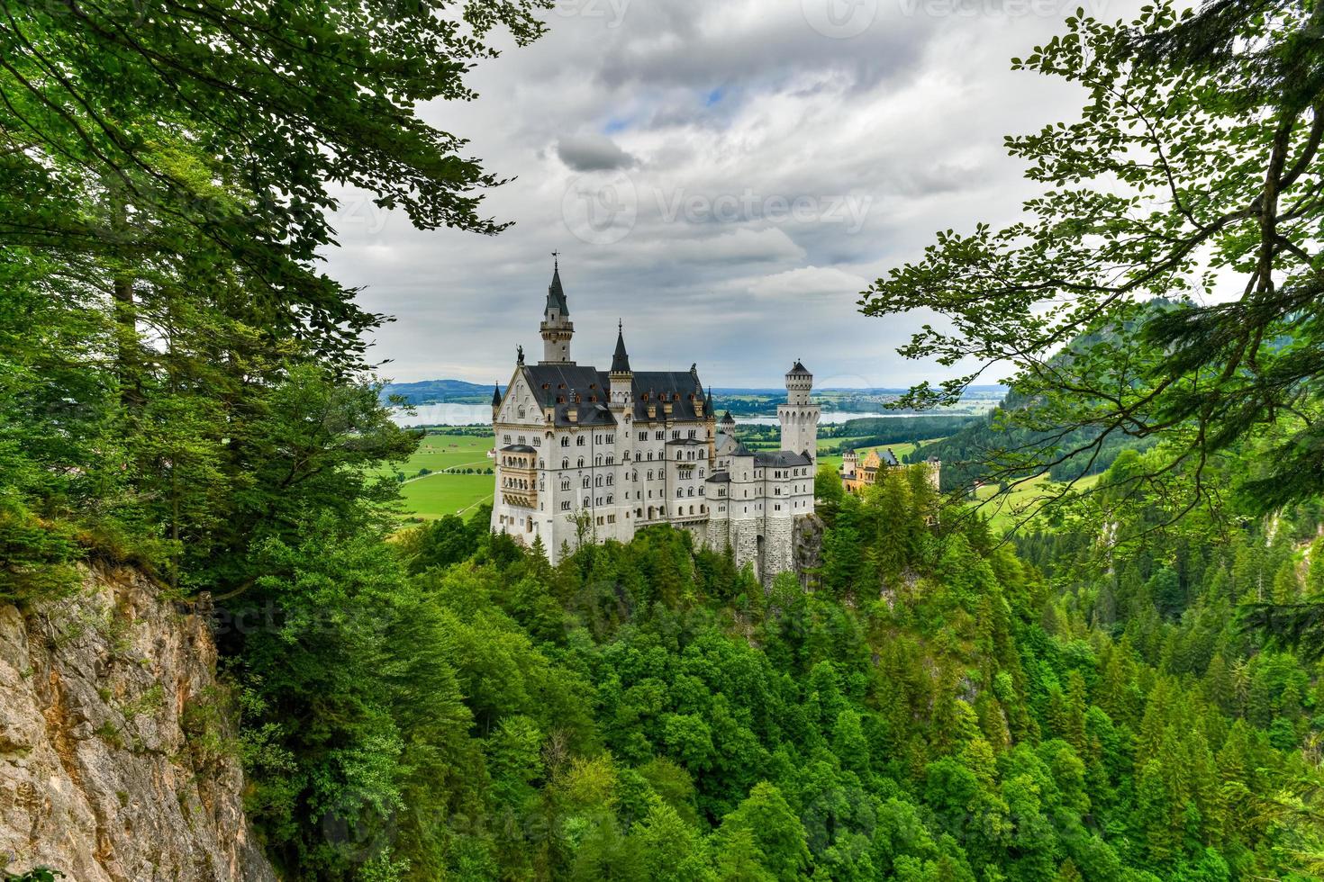 World-famous Neuschwanstein Castle, the nineteenth-century Romanesque Revival palace built for King Ludwig II on a rugged cliff near Fussen, southwest Bavaria, Germany photo