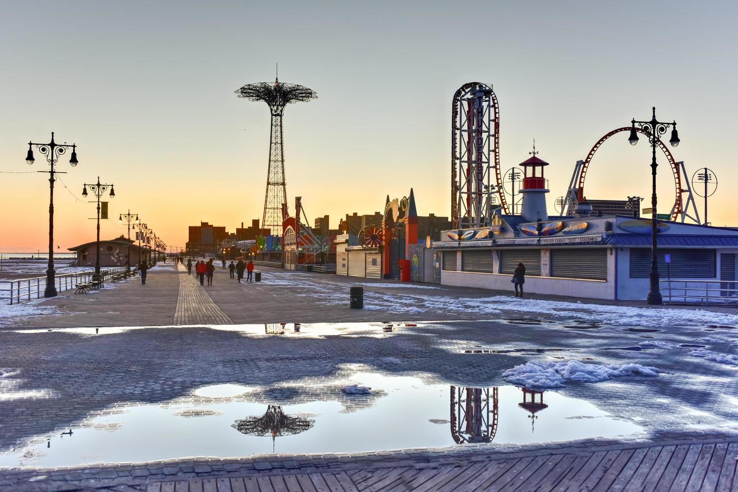 Coney Island Boardwalk with Parachute Jump in the background in Coney Island, NY, 2022 photo