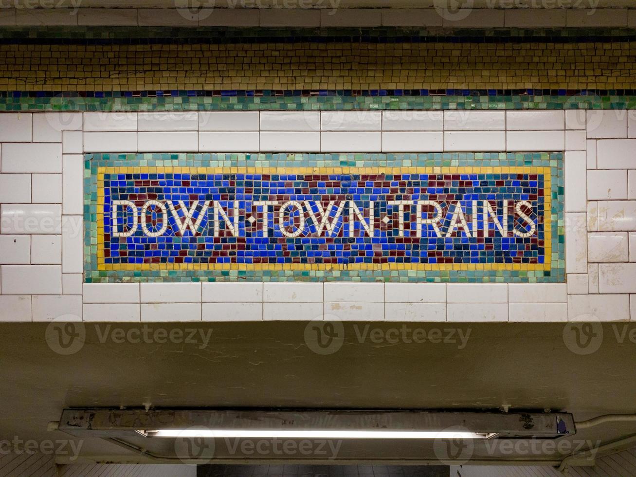 Vintage sign for downtown trains made of mosaic tiles photo