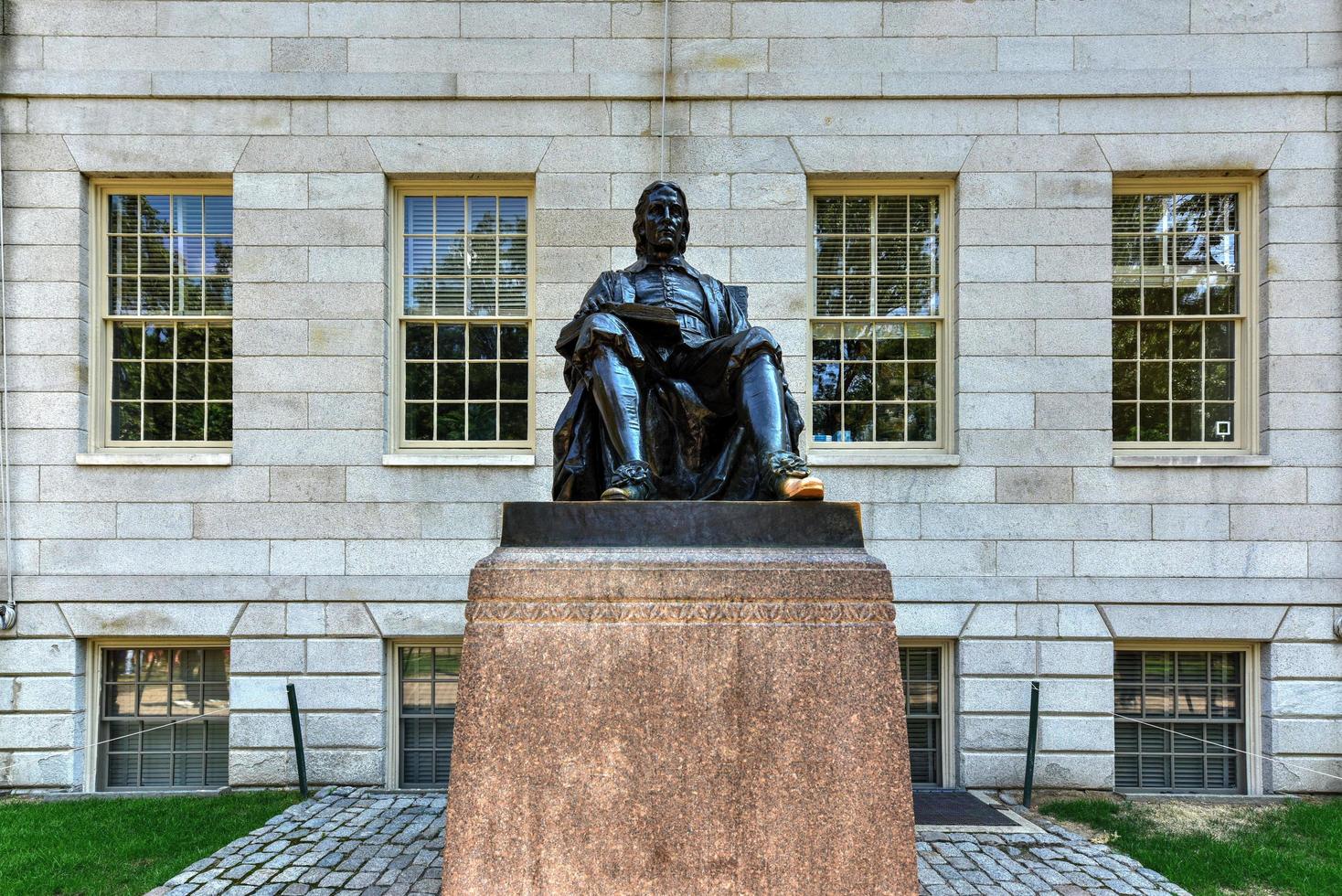 John Harvard statue in Harvard University in Cambridge, Massachusetts, USA, 2022 photo