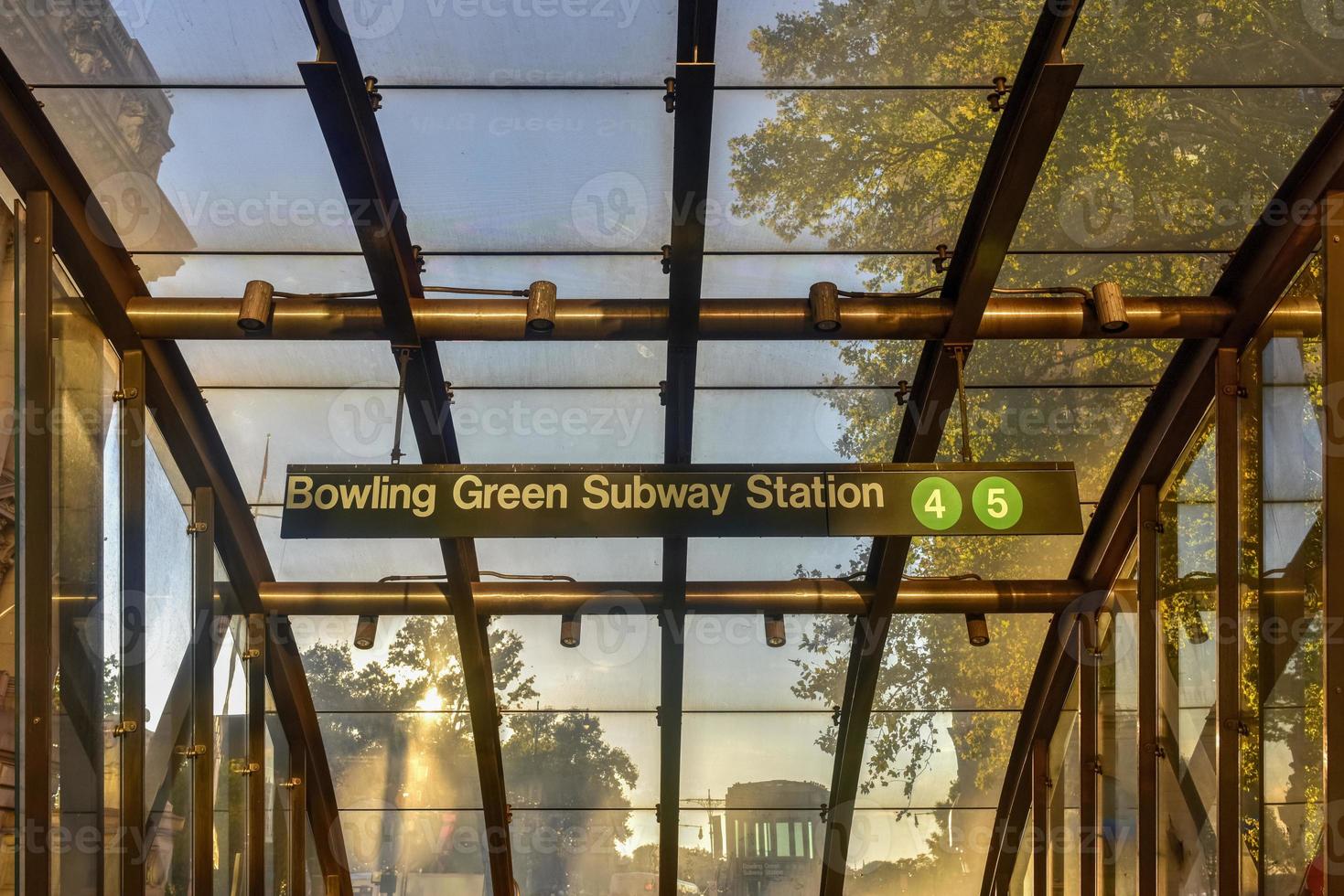 Outdoors glass entrance to the Bowling Green Subway Station in downtown Manhattan in New York City. photo
