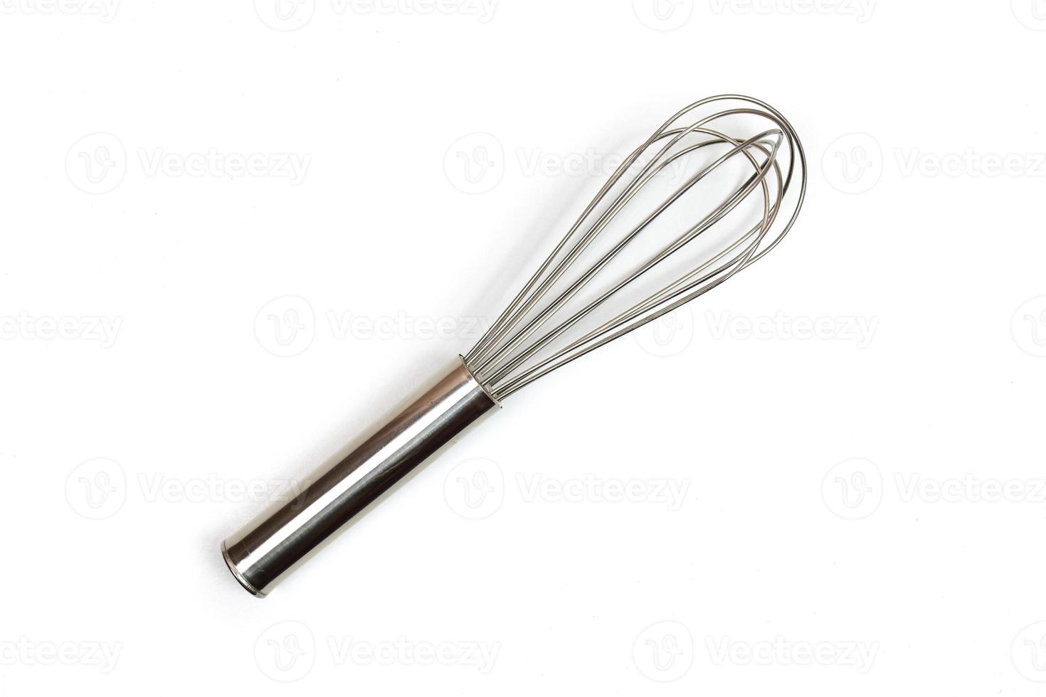 Flat lay of Silver Whisk isolated on white background. Kitchen equipment. photo