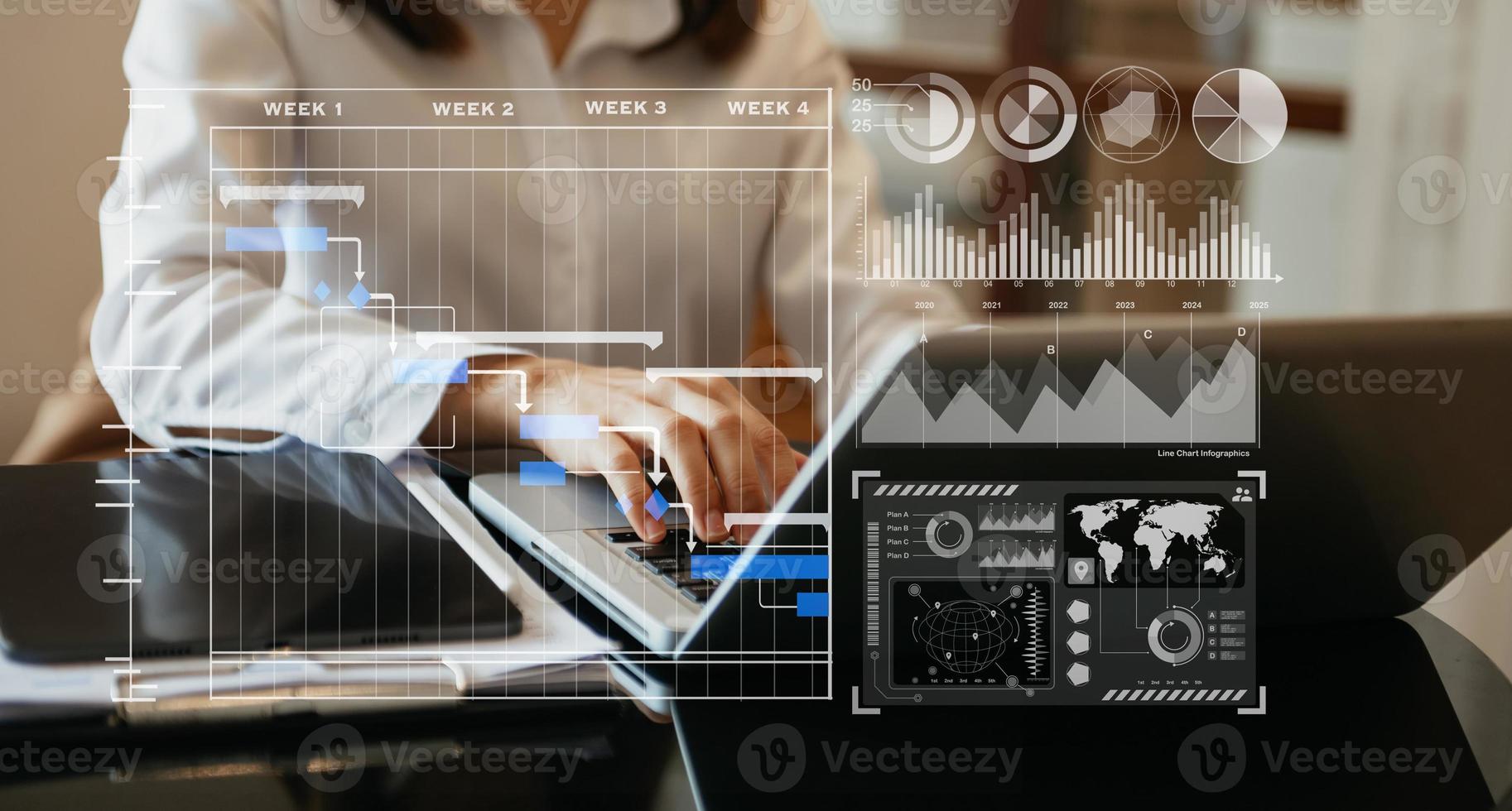 Businessman hand Project manager working and update tasks and Gantt chart scheduling virtual diagram.with smart phone, tablet and laptop in office. photo