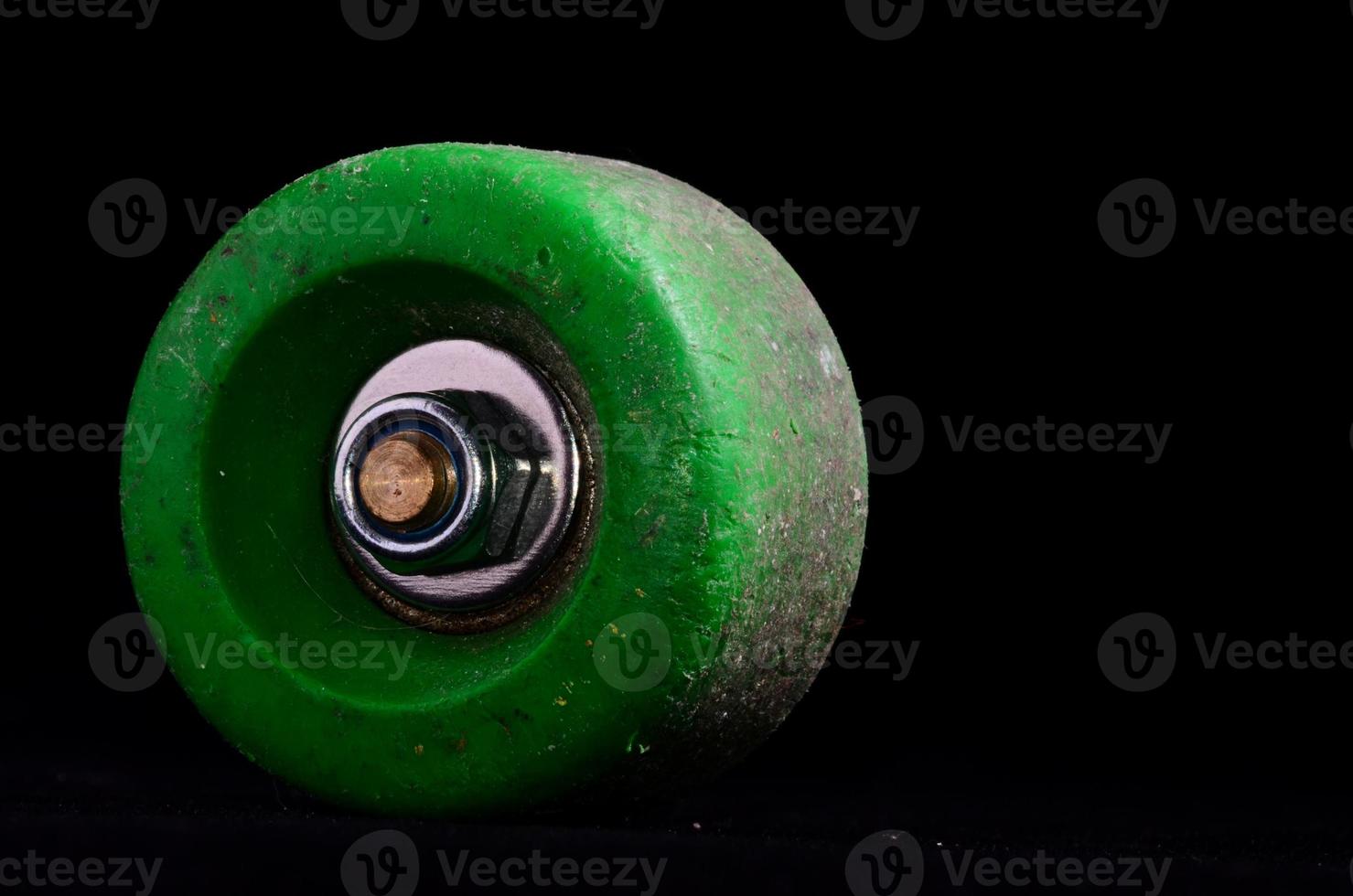 Skate wheel on black background photo