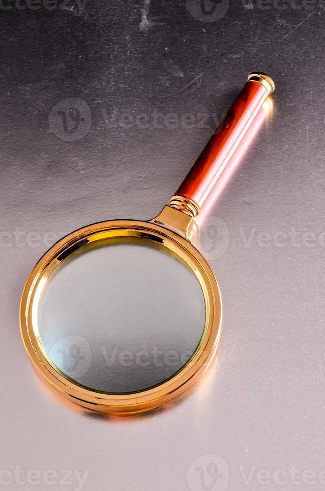 Isolated magnifier glass photo