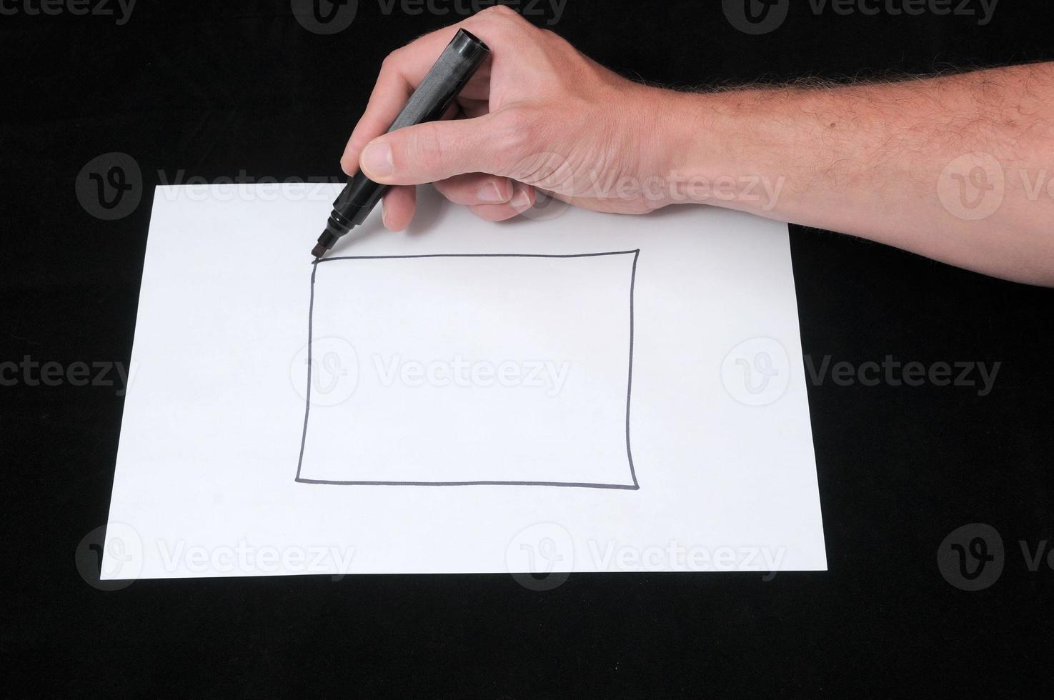Drawing on a White Paper photo
