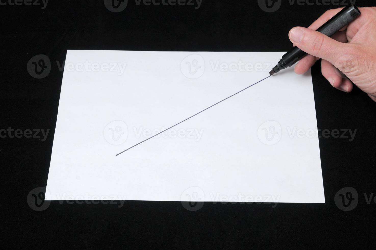 Drawing on a White Paper photo