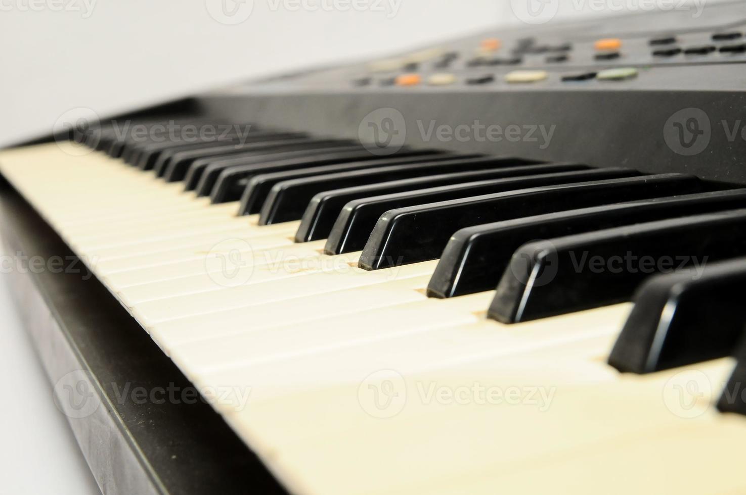 Piano keyboard closeup photo