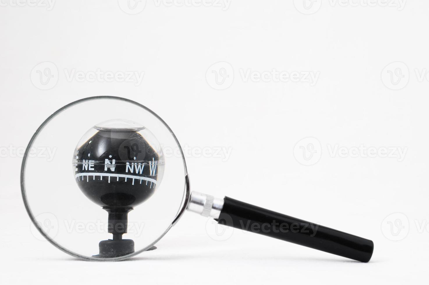 Analog Compass with magnifier glass photo