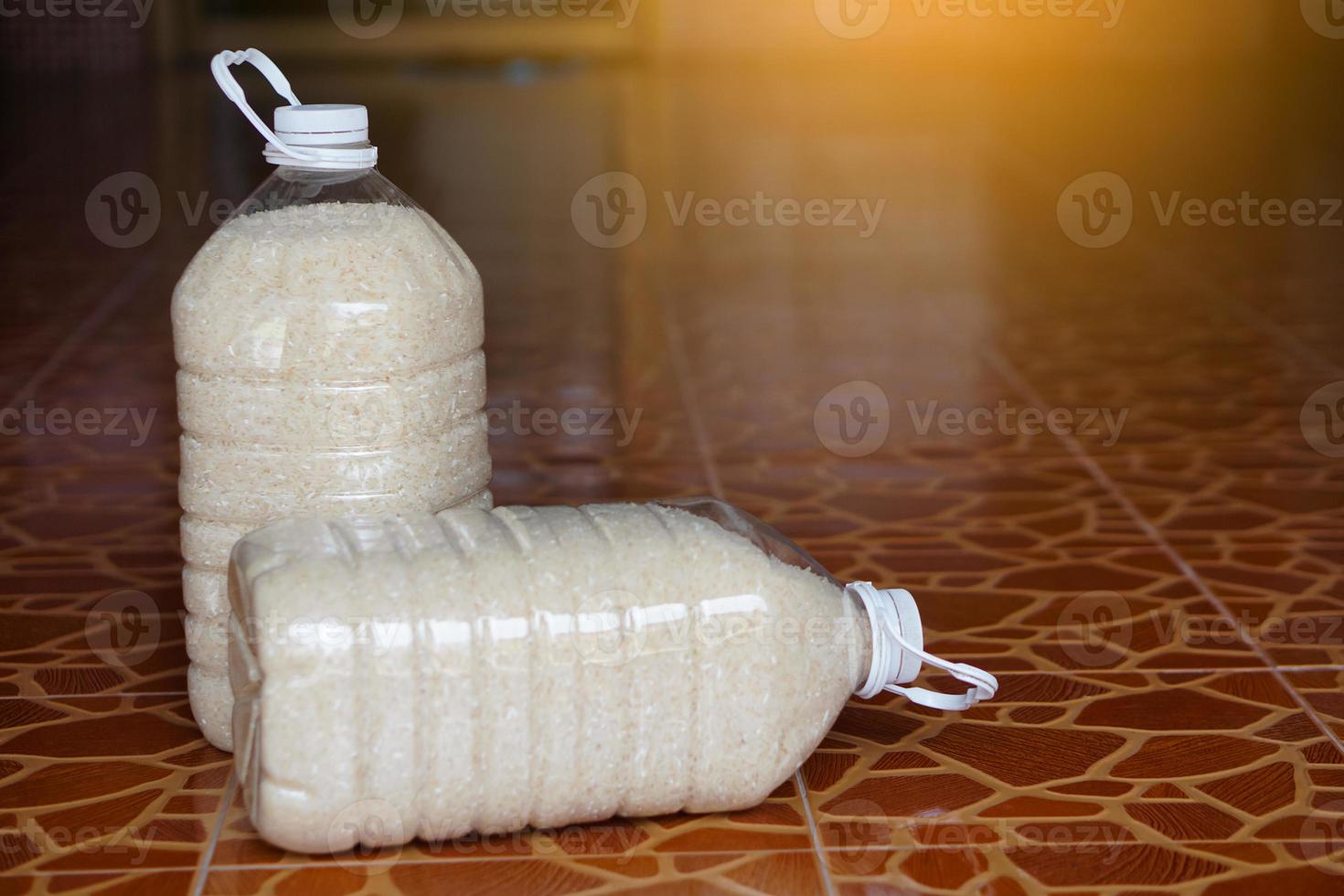 Two plastic bottles that contain grains of rice to prevent from dust or insects. DIY. Concept, reuse plastic bottle. Zero waste. photo