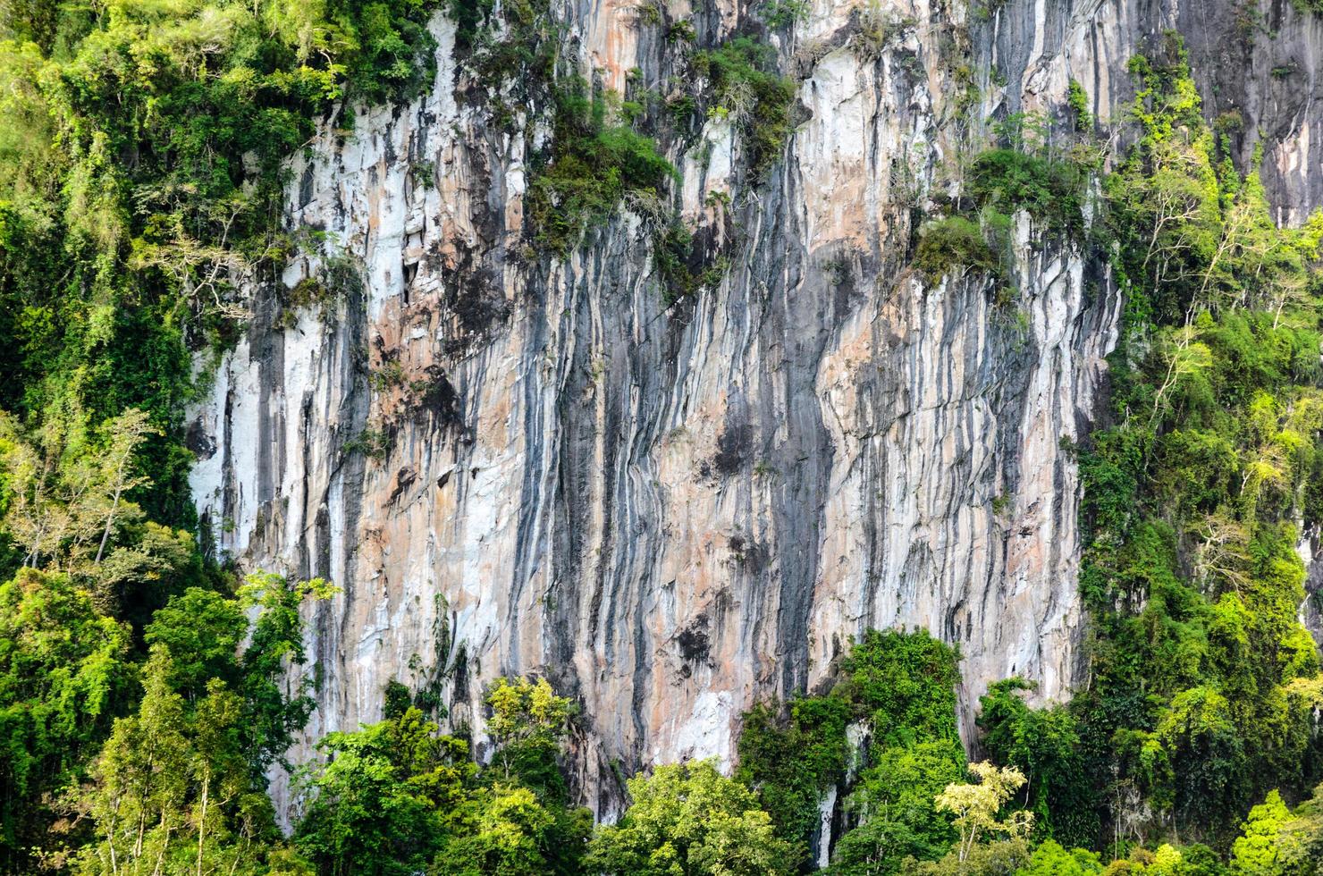 Stripes of rock cliff photo