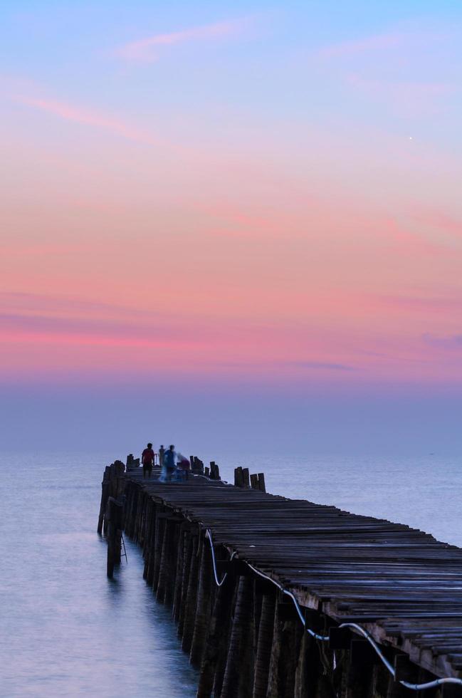 Fishing pier at sunrise photo