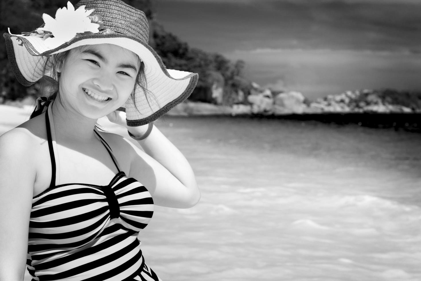 Black and white girl on the beach at Thailand photo