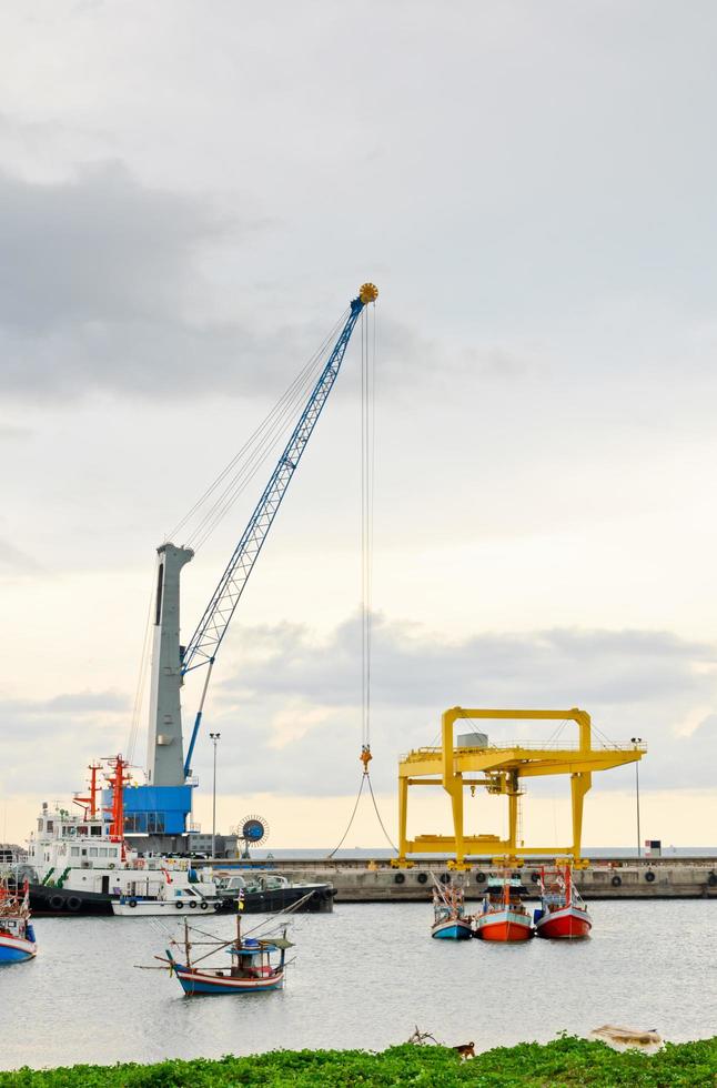 Harbor crane on the sea photo