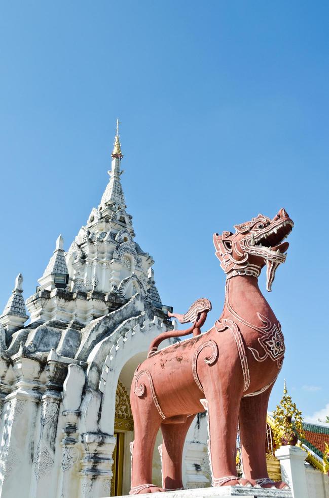 Red Lion statue at Wat Phra That Hariphunchai photo