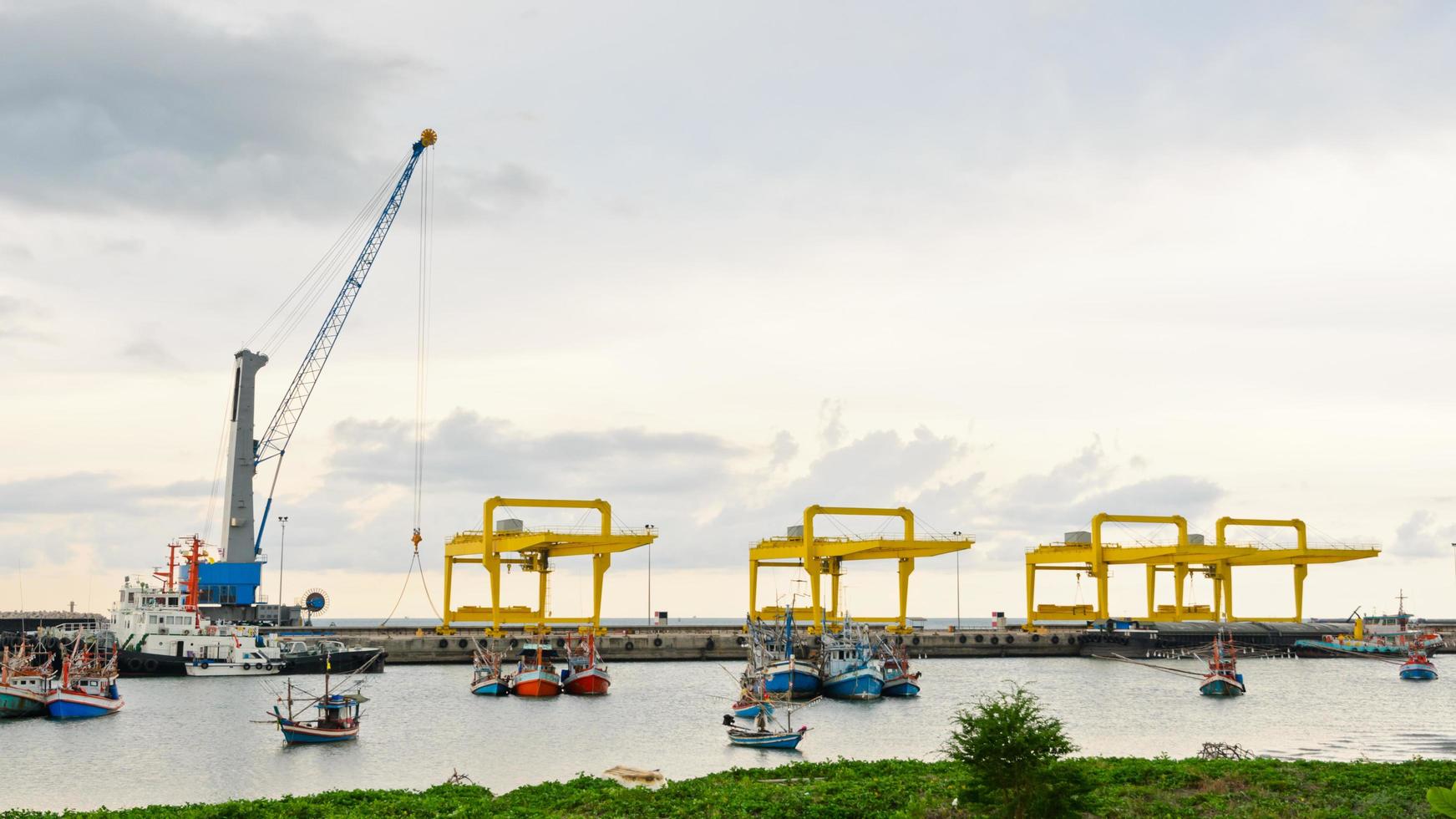 Harbor crane on the sea photo