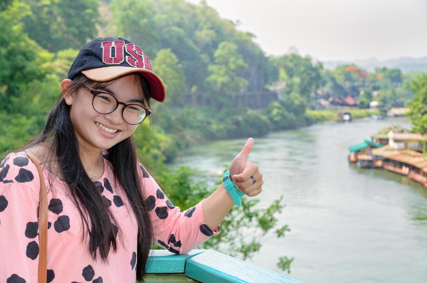 Tourist on Death Railway bridge viewpoint photo