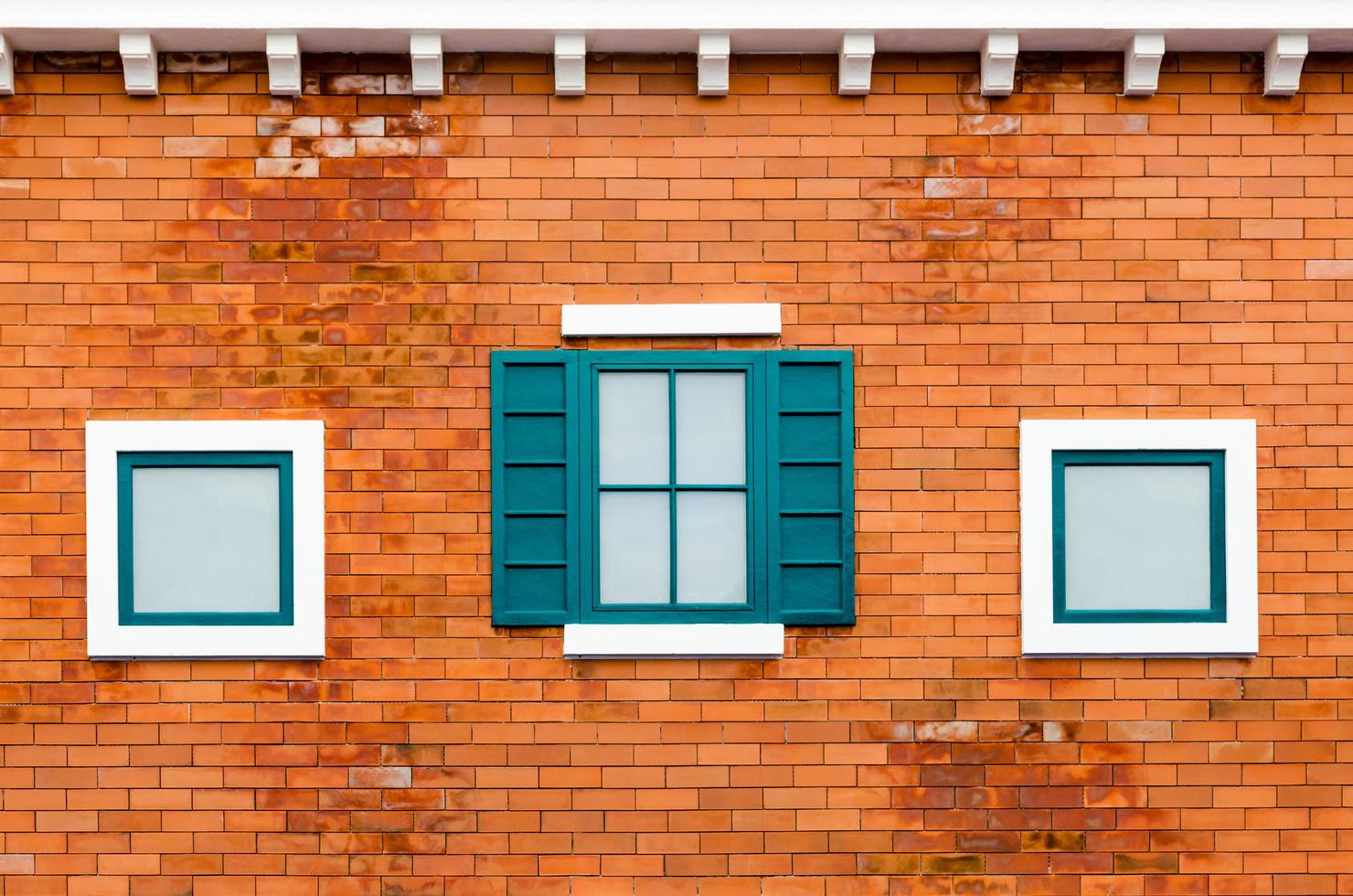 Window on the orange brick wall photo
