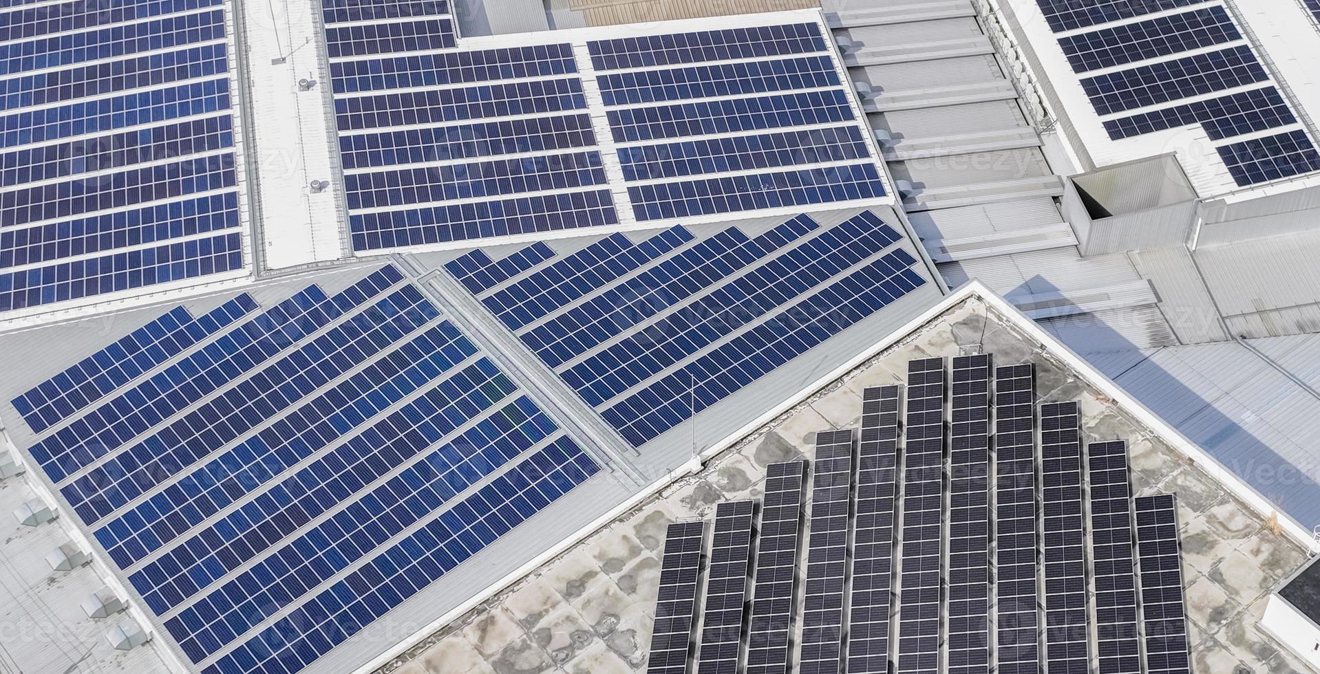 Aerial view of solar panels or photovoltaic module. Solar power for green energy. Sustainable resources. Solar cell panels use sun light as a source to generate electricity. Photovoltaics or PV. photo