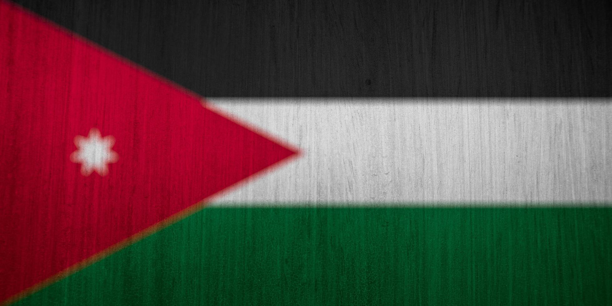 textura de la bandera jordana como fondo foto