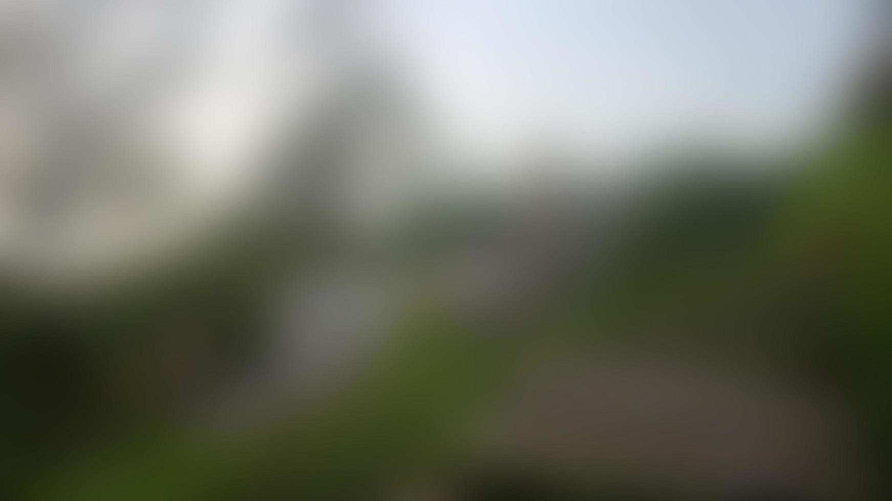 defocused stairs, green grass and sulfur rocks in a tourist place photo