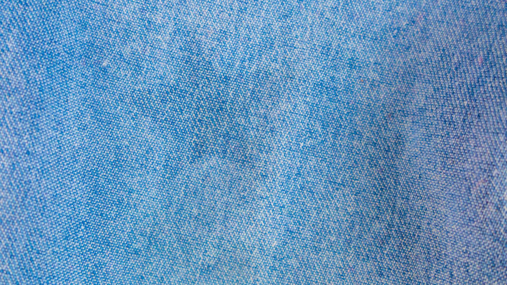 textura de mezclilla azul como fondo foto