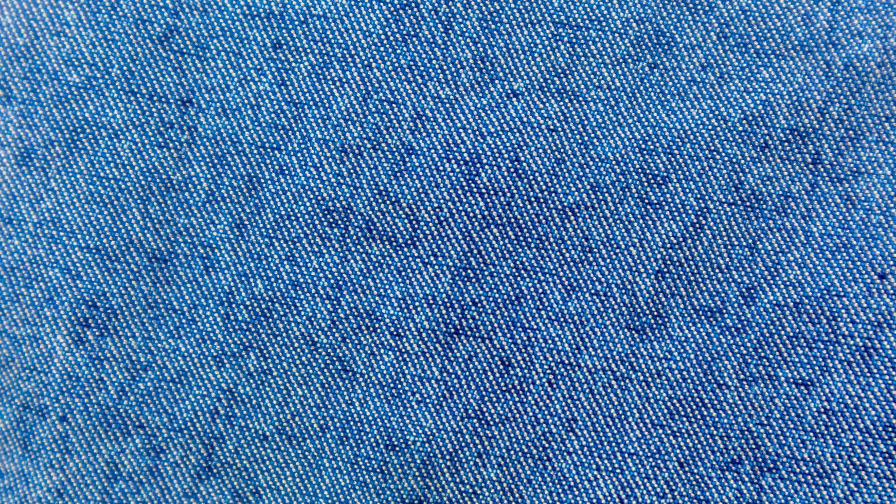 Blue jeans texture as a background photo