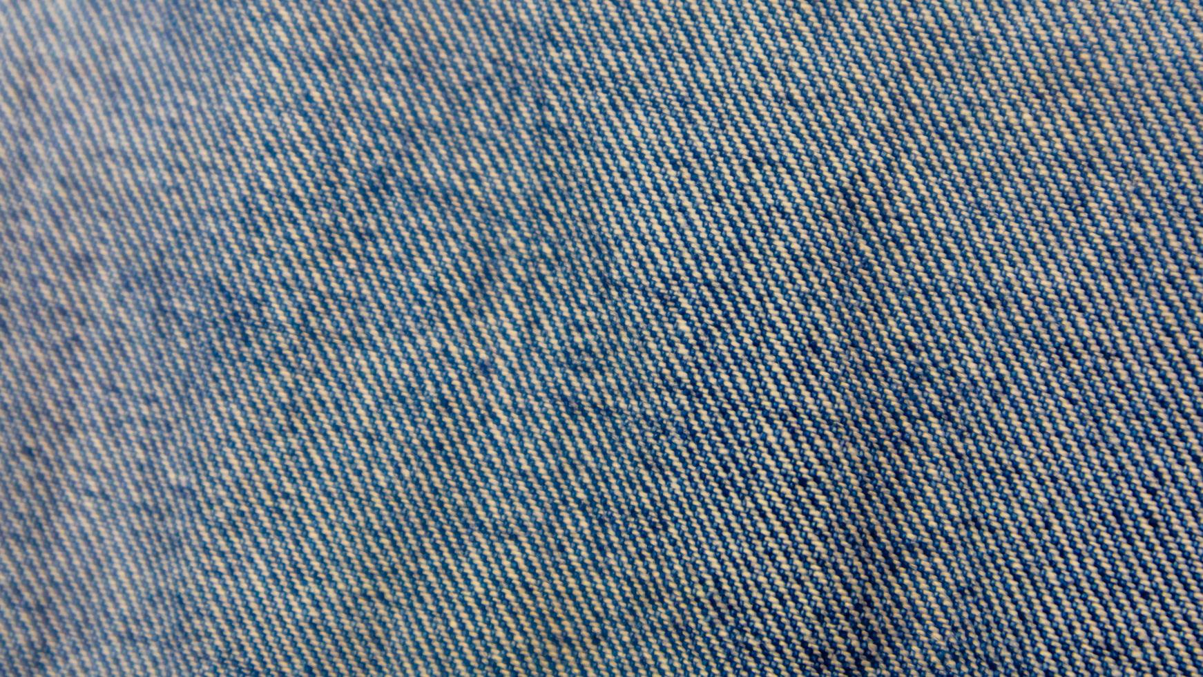 Blue jeans texture as a background photo