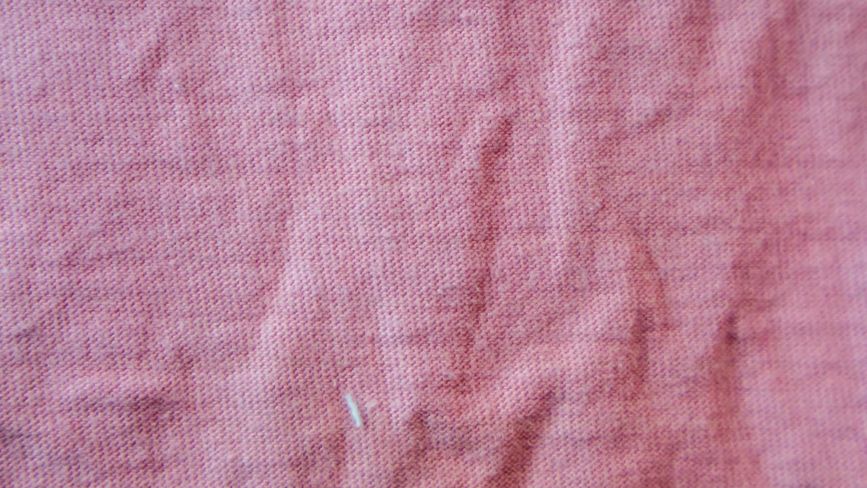 pink cloth texture as background photo