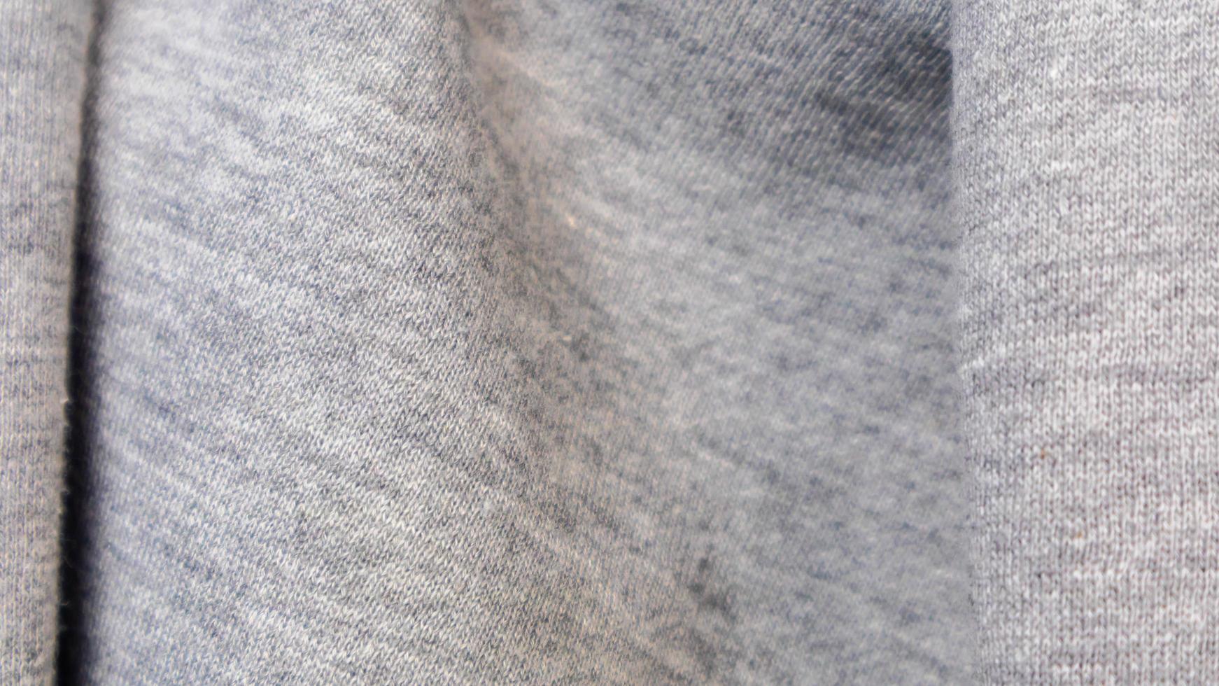 la textura de la tela de algodón gris como fondo foto