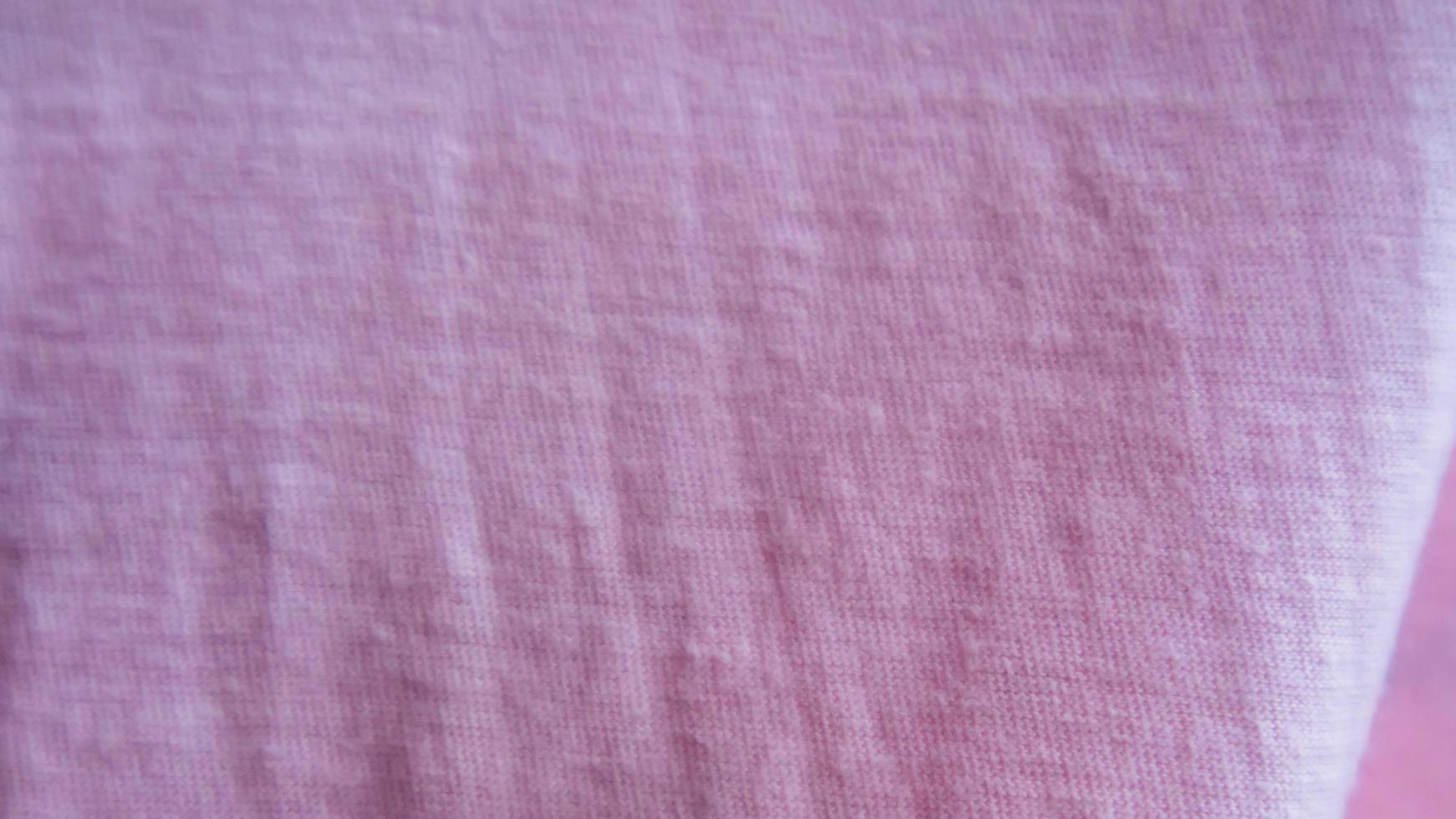 textura de tela rosa como fondo foto