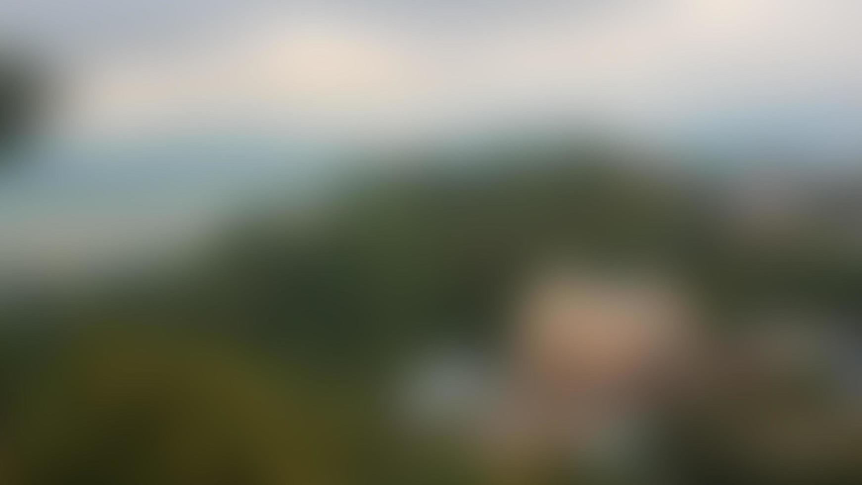 defocused Church in a village in the hills photo