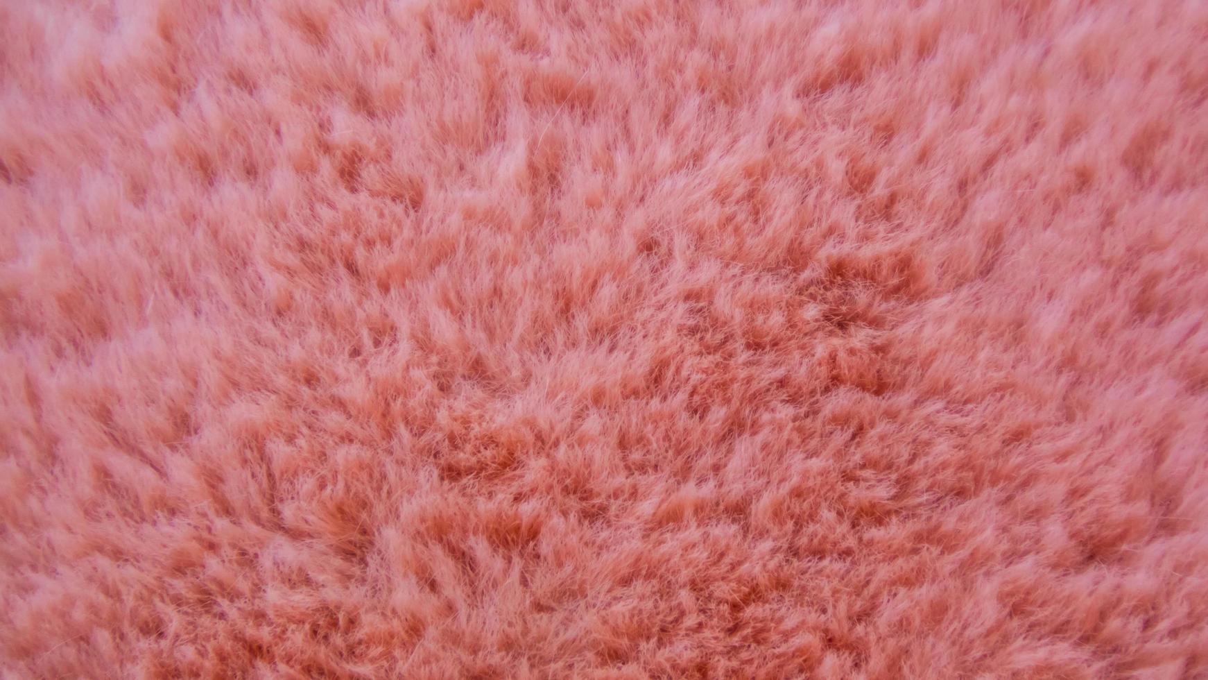 textura de lana rosa como fondo foto