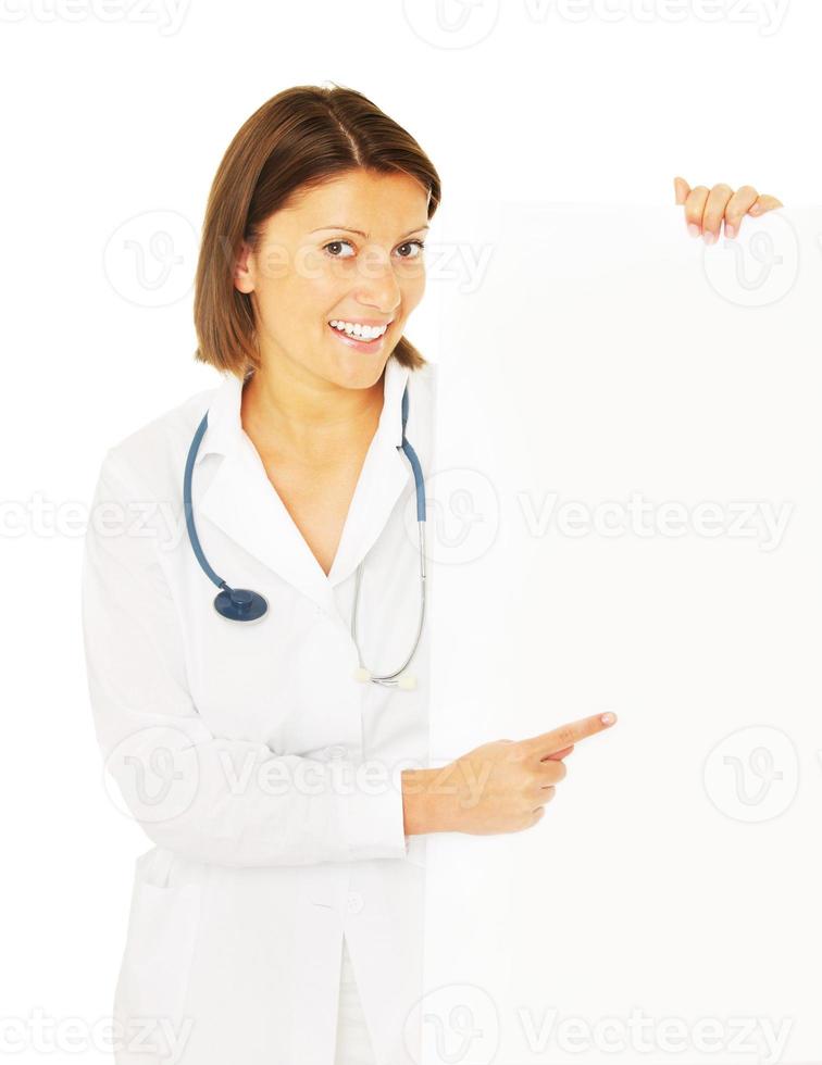 Young female doctor with stethoscope photo