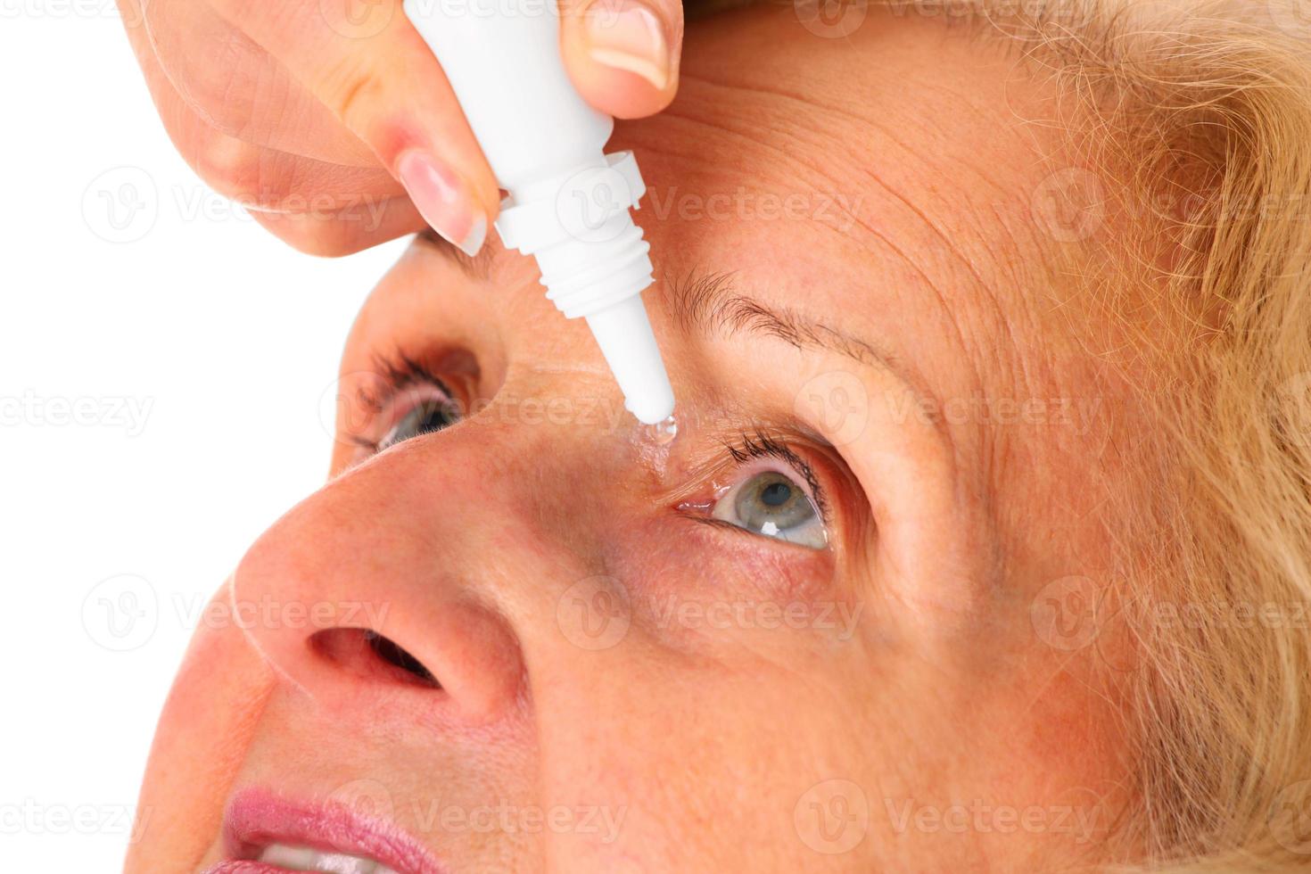 Eyedrops application concept photo