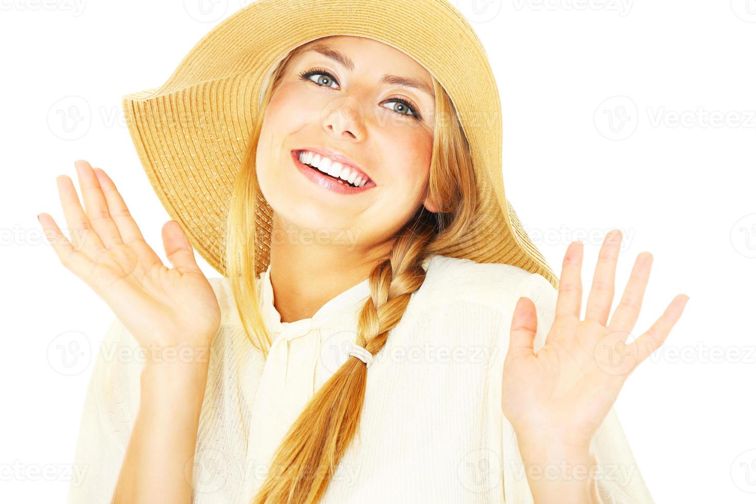 Blond woman with beach hat photo