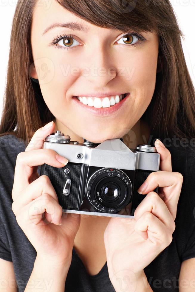 Young photographer with camera photo