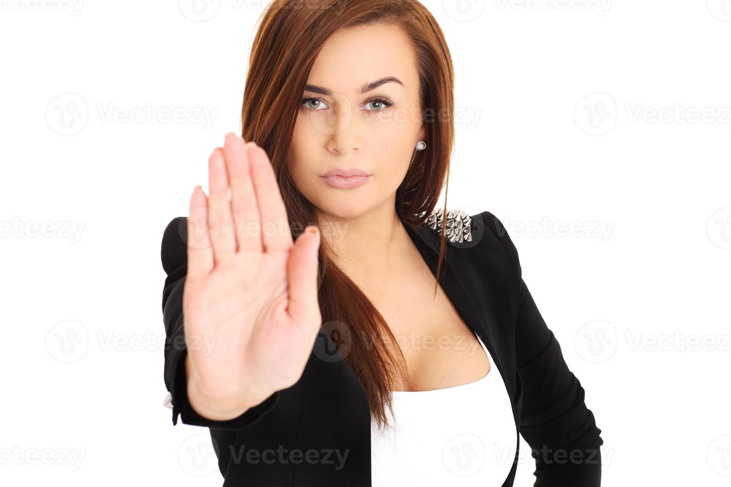 mujer haciendo señal de stop foto