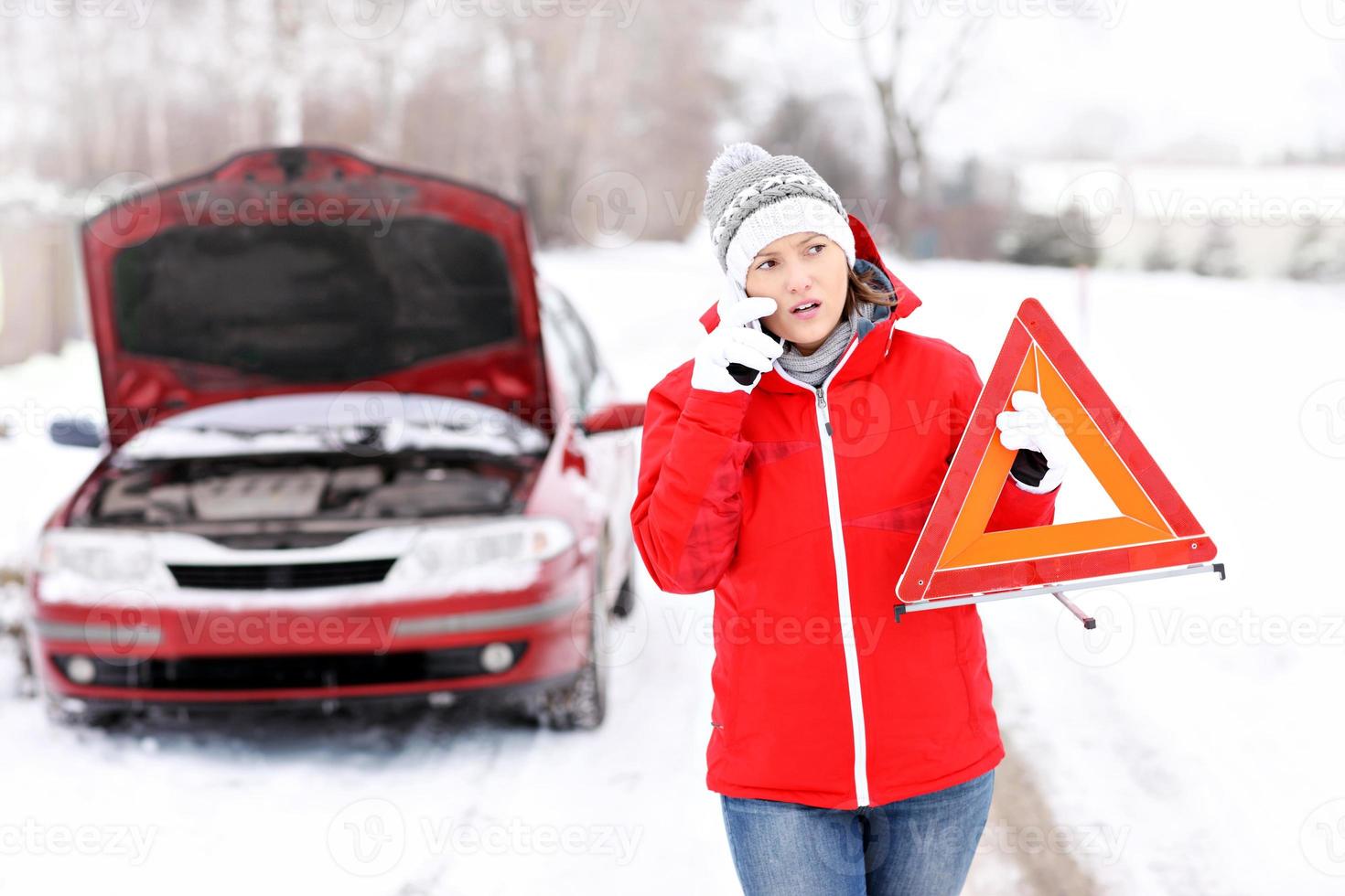 Woman with red jacket during winter photo