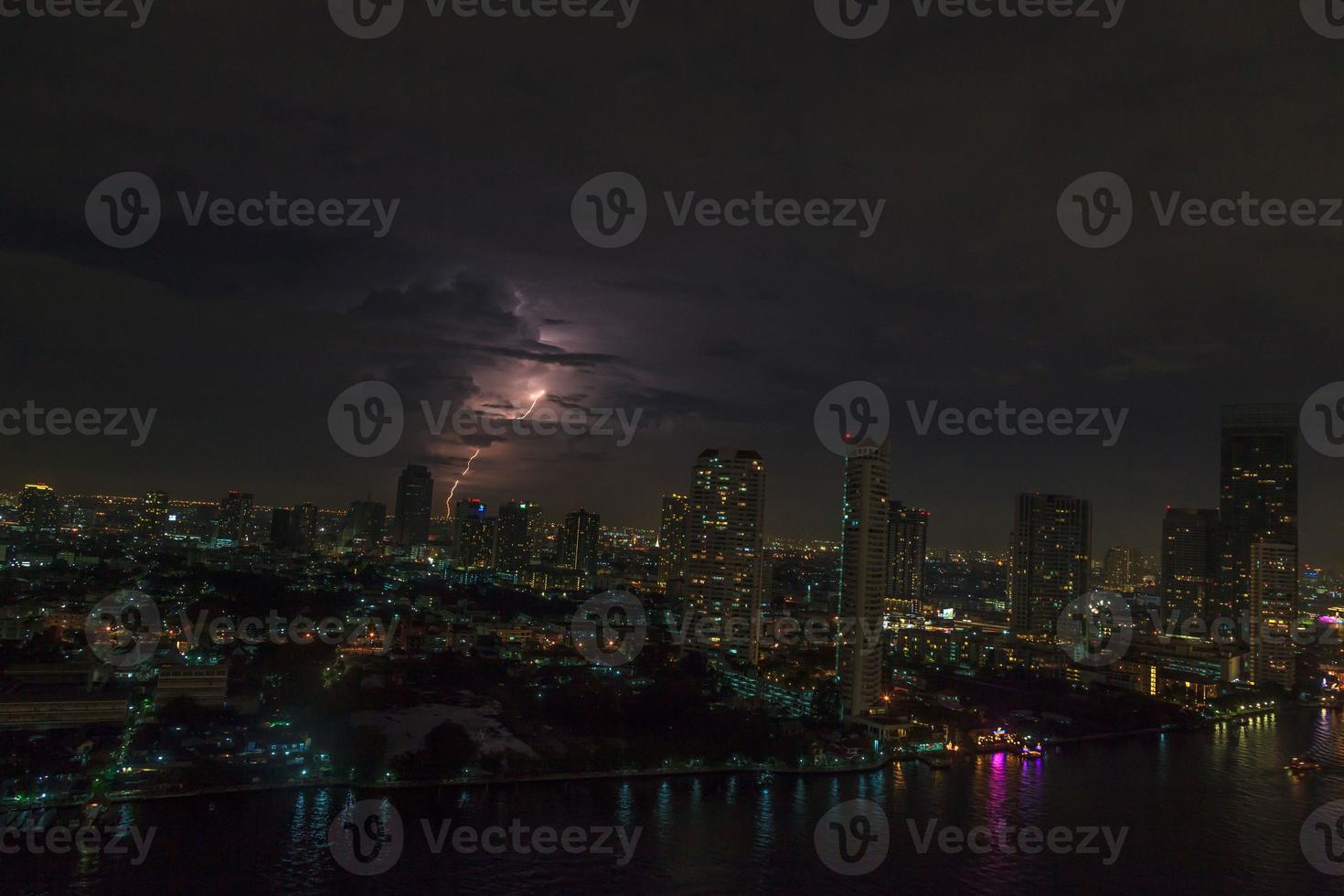 Aerial view of lightning strike in nightly Bangkok skyline photo