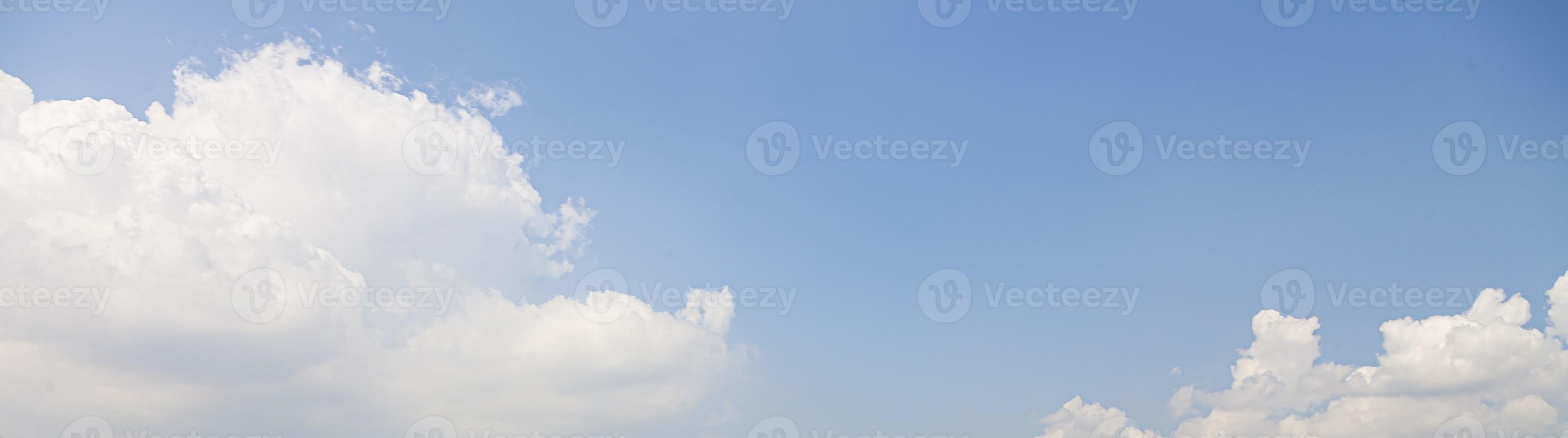 Image of a partly cloudy and partly clear sky during the day photo