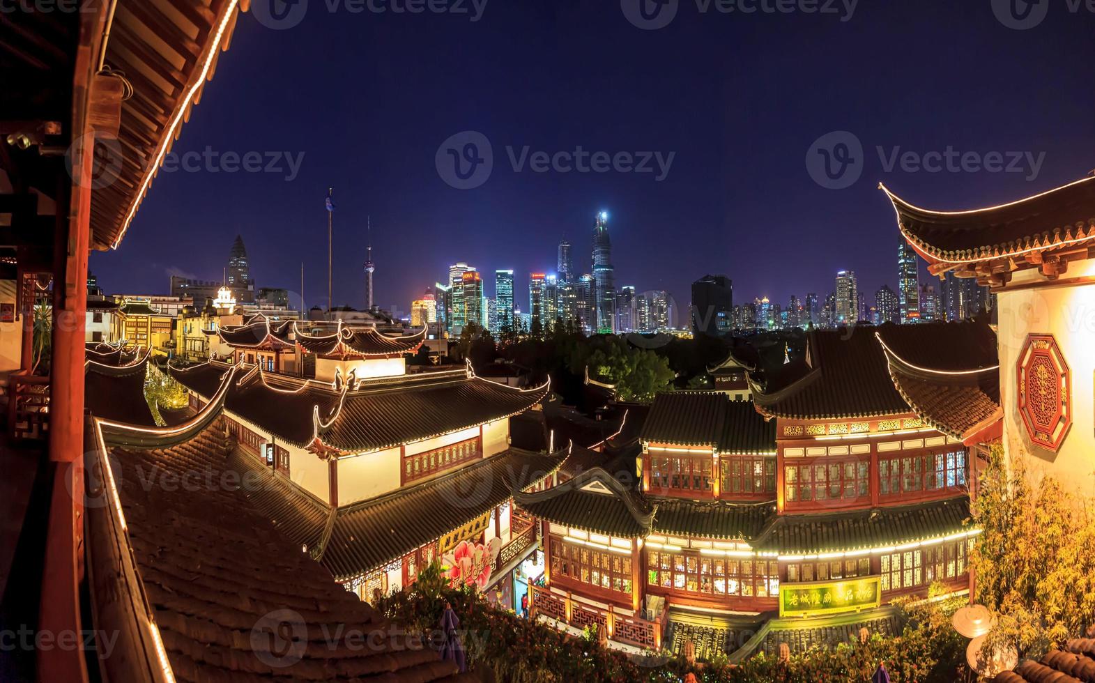 Panoramic image of Shanghai Pudong district skyline from the historic city center at night photo